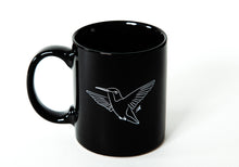 Load image into Gallery viewer, black and white coffee mug with a hummingbird design
