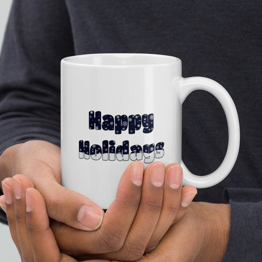 Happy Holidays coffee mug with a winter scene  inside the text