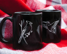 Load image into Gallery viewer, Black coffee mug with Hummingbird and Cardinal designs
