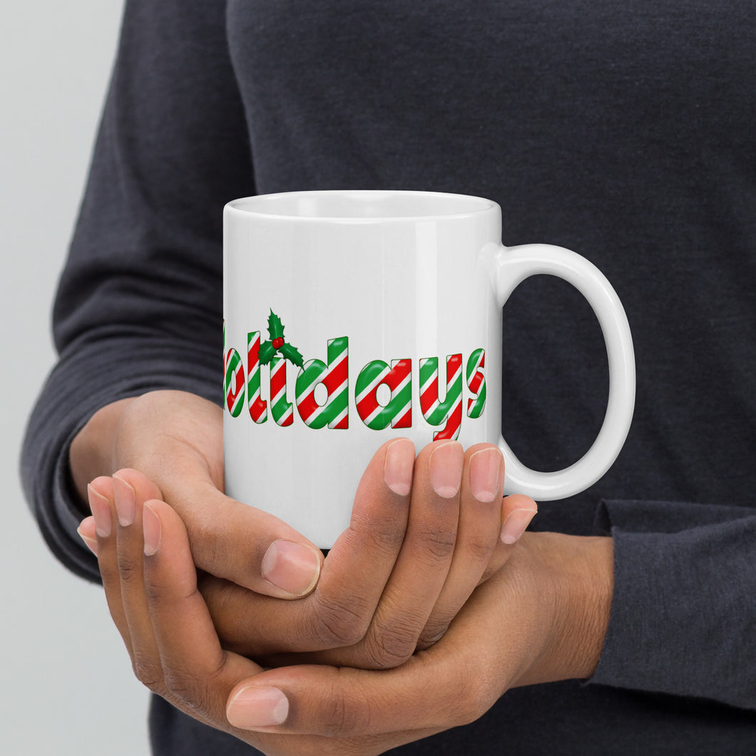 Model holding JD's Mug Shoppe's Christmas Coffee Mug